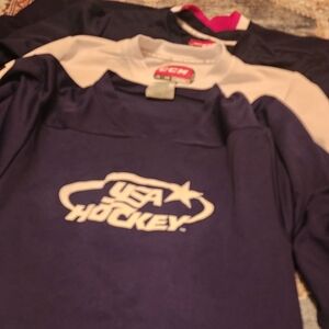 4 Youth Large or Youth XL hockey jerseys
